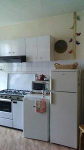 Maisons de vacances Antique maison de montagne en ville ! : photos des chambres