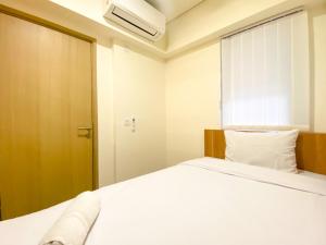 Comfort Stay and Cozy 2BR at Meikarta Apartment By Travelio