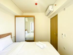 Comfort Stay and Cozy 2BR at Meikarta Apartment By Travelio