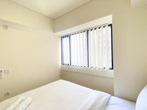 Comfort Stay and Cozy 2BR at Meikarta Apartment By Travelio