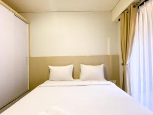 Best Homey 2BR at Meikarta Apartment By Travelio