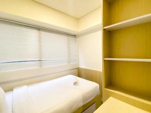 Best Homey 2BR at Meikarta Apartment By Travelio