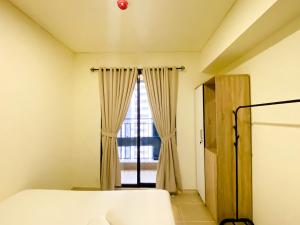 Nice and Simply 2BR at Meikarta Apartment By Travelio