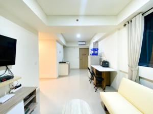 Nice and Simply 2BR at Meikarta Apartment By Travelio