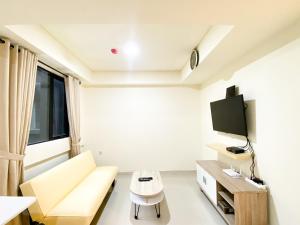 Nice and Simply 2BR at Meikarta Apartment By Travelio