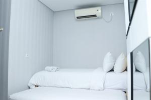 Nice and Comfy 2BR Apartment at Royal Olive Residence By Travelio