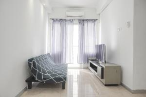 Nice and Cozy 3BR at Grand Palace Kemayoran Apartment By Travelio