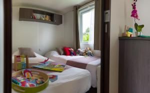 Campings Camping Officiel Siblu Domaine de Kerlann : photos des chambres