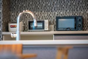 新屋 札幌市中心薄野車程5分鐘 挑高設計客廳 可停車1台 高速Wi Fi 地鐵徒步5分 一站到薄野