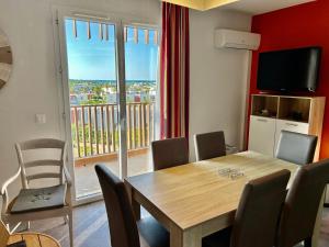 Cosy plage - Apt entièrement climatisé avec piscine partagée et garage clos