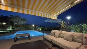 Villas Belle villa calme, piscine, 4 chambres climatisees a 8km de Montpellier classee meuble de tourisme 4 etoiles : photos des chambres