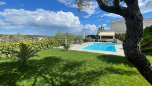 Villas Belle villa calme, piscine, 4 chambres climatisees a 8km de Montpellier classee meuble de tourisme 4 etoiles : photos des chambres