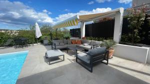 Villas Belle villa calme, piscine, 4 chambres climatisees a 8km de Montpellier classee meuble de tourisme 4 etoiles : photos des chambres