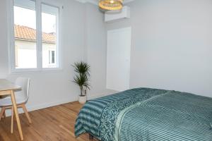 Appartements Chez Barrau - Confort et charme au coeur de Lourdes : photos des chambres
