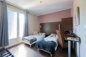 Hotels Hotel de La Beauronne : photos des chambres