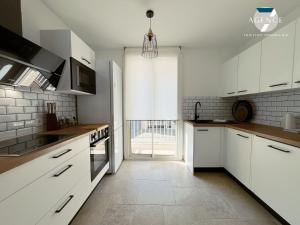 Appartements Le Suffren : photos des chambres