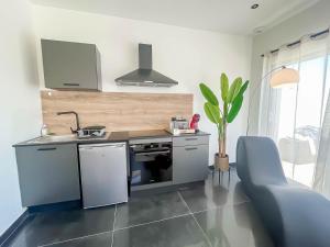 Appartements Suite avec jacuzzi et piscine : photos des chambres