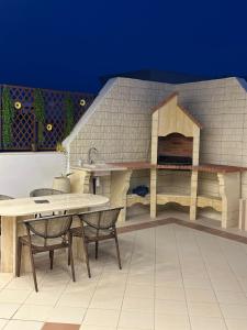 Superbe penthouse avec piscine et barbecue