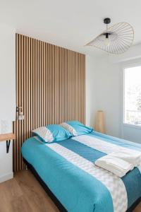 Appartements T2 parking gratuit plus 2 balcons : photos des chambres