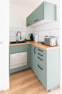 Appartements T2 parking gratuit plus 2 balcons : photos des chambres