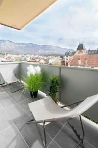 Appartements T2 parking gratuit plus 2 balcons : photos des chambres