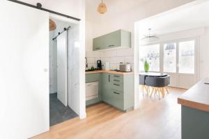 Appartements T2 parking gratuit plus 2 balcons : photos des chambres