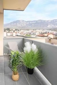 Appartements T2 parking gratuit plus 2 balcons : photos des chambres