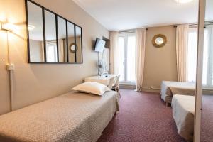 Hotels Grand Hotel De Paris : photos des chambres