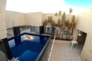 Apto novo de dois qtos próximo à praia com dois WC