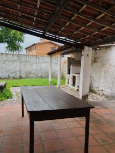 Casa com quintal à praia