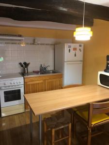 Maisons de vacances Charmant studio dans maison privee : photos des chambres