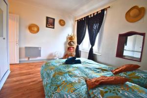 Appartements Le Jardin Paisible Beaumontois : photos des chambres