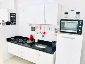 Aconchego na Praia do Morro - 2 quartos com Varanda e Garagem - Perto do Mar