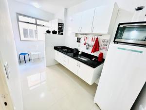 Aconchego na Praia do Morro - 2 quartos com Varanda e Garagem - Perto do Mar