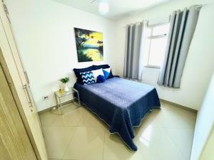 Aconchego na Praia do Morro - 2 quartos com Varanda e Garagem - Perto do Mar