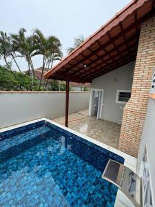 Casa na praia com piscina e Wi-fi