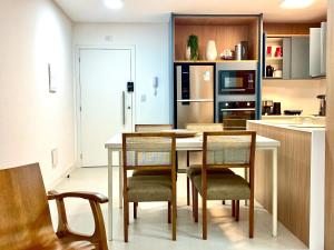 Férias na praia c piscina e espaço de lazer