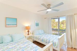 Newly remodeled 8-steps to sand path of Beach! Unit A