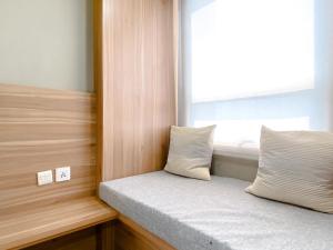 Simply Look Studio at Mustika Golf Residence (No Kitchen) Apartment By Travelio