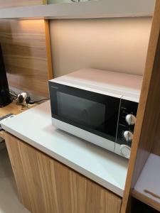 Simply Look Studio at Mustika Golf Residence (No Kitchen) Apartment By Travelio