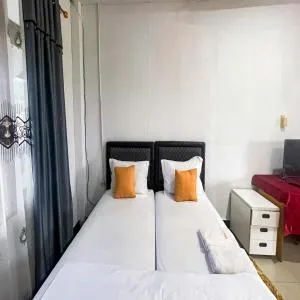 RedDoorz near Salib Kasih Tarutung - Halangan