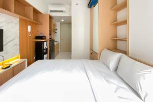 Nice and Compact Studio at Tokyo Riverside PIK 2 Apartment By Travelio