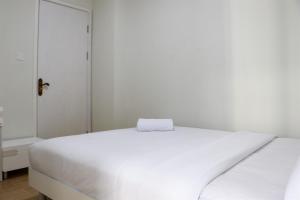 Brand New 2BR at Daan Mogot City Apartment By Travelio
