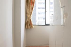 Brand New 2BR at Daan Mogot City Apartment By Travelio