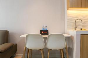 Brand New 2BR at Daan Mogot City Apartment By Travelio