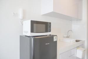 Tranquil Stay Studio with Sea View at Tokyo Riverside PIK 2 Apartment By Travelio