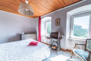 Maisons de vacances La Maison de Freda - Maison avec vue montagne : photos des chambres