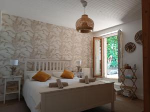Maisons de vacances Maison berrichonne WiFi jardin linge : photos des chambres
