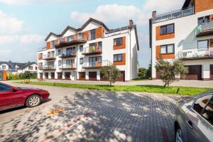 Przestronny Apartament z Parkingiem we Władysławowie by Noclegi Renters