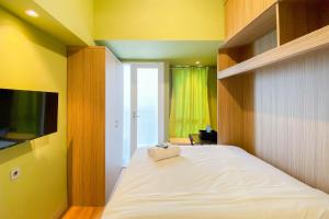 Fully Furnished with Cozy Design Studio Apartment Tokyo Riverside PIK 2 By Travelio